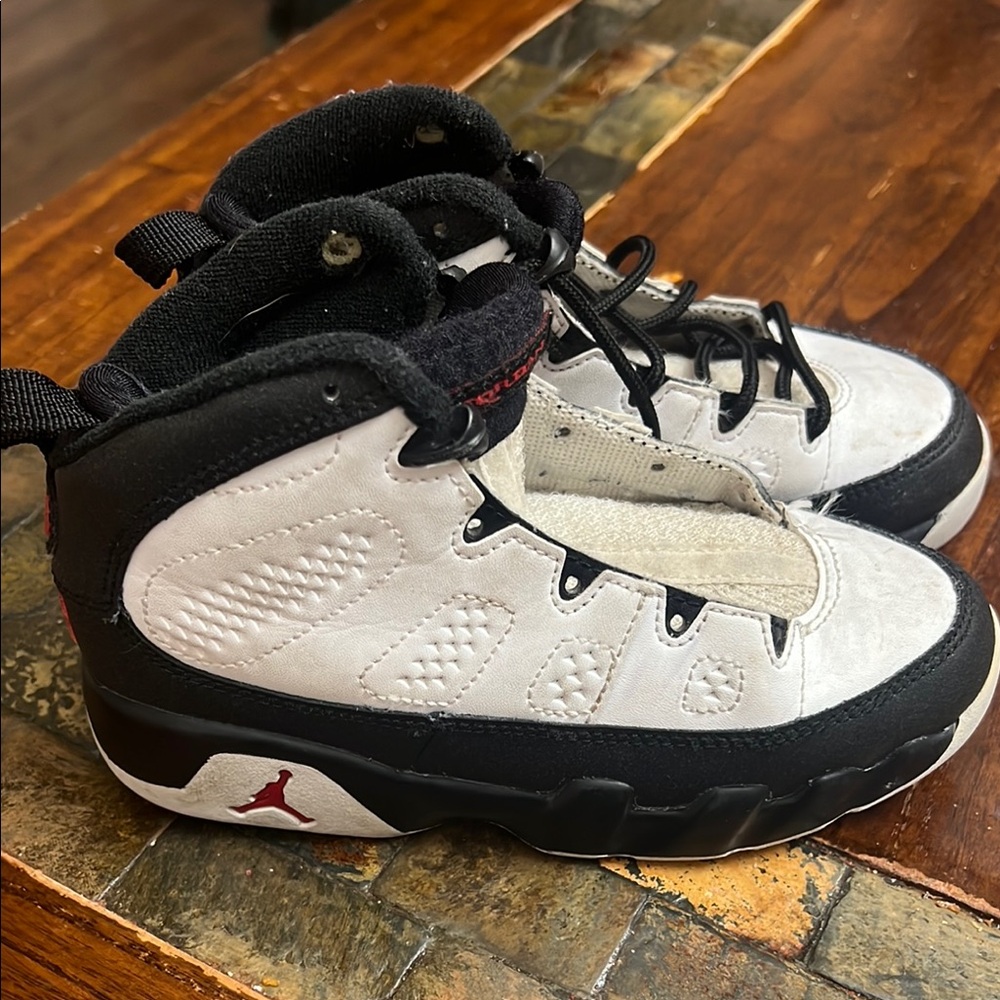 Jordan Black and White High-Top Sneakers
